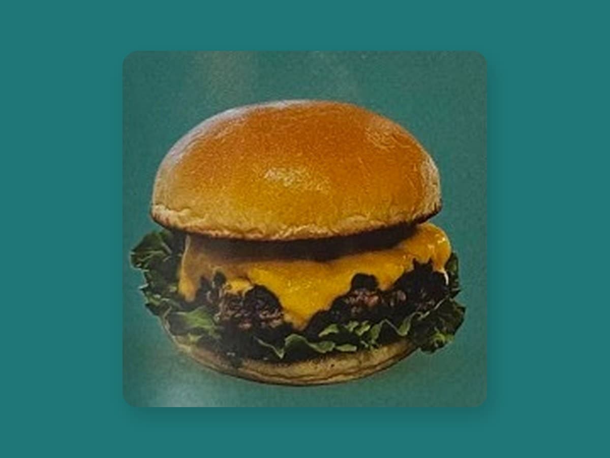 Classic smash burger with cheese and salad