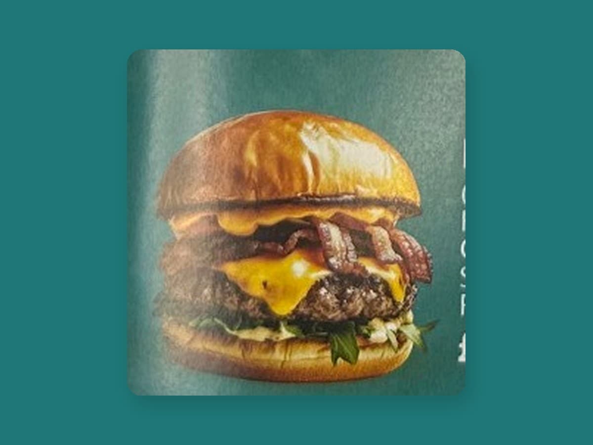King Kong burger stacked with beef, chicken and bacon